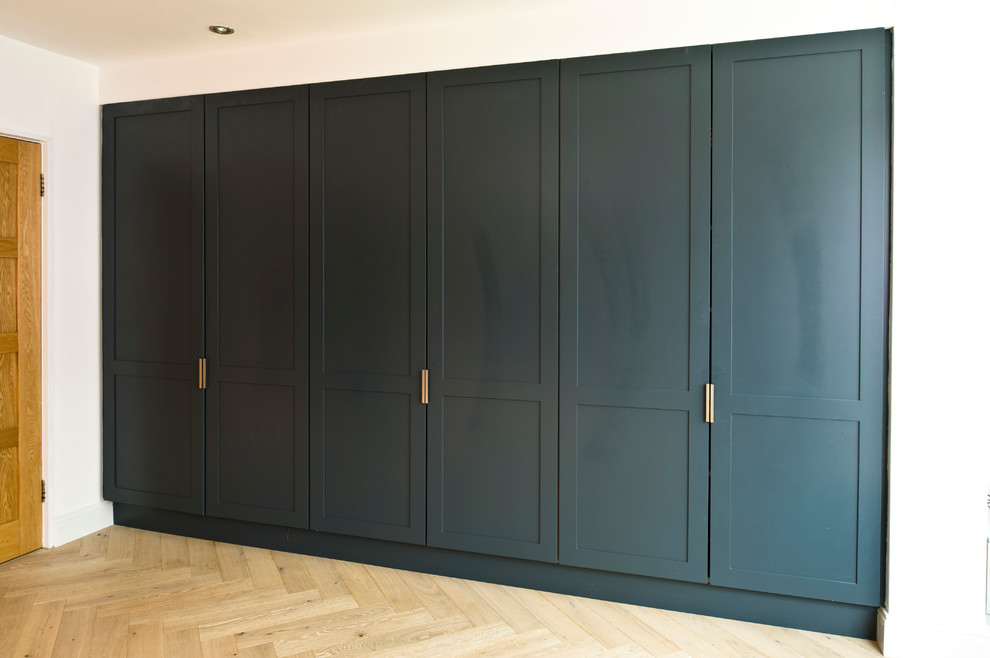 Design ideas for a contemporary single-wall laundry cupboard in Dublin with shaker cabinets and grey cabinets.