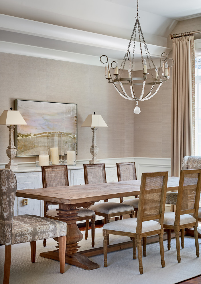 This is an example of a beach style dining room in Charlotte with beige walls and no fireplace.