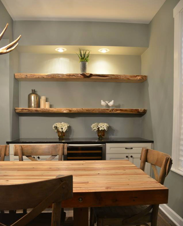 Inspiration for a mid-sized rustic dark wood floor and brown floor dining room remodel in Chicago with gray walls and no fireplace