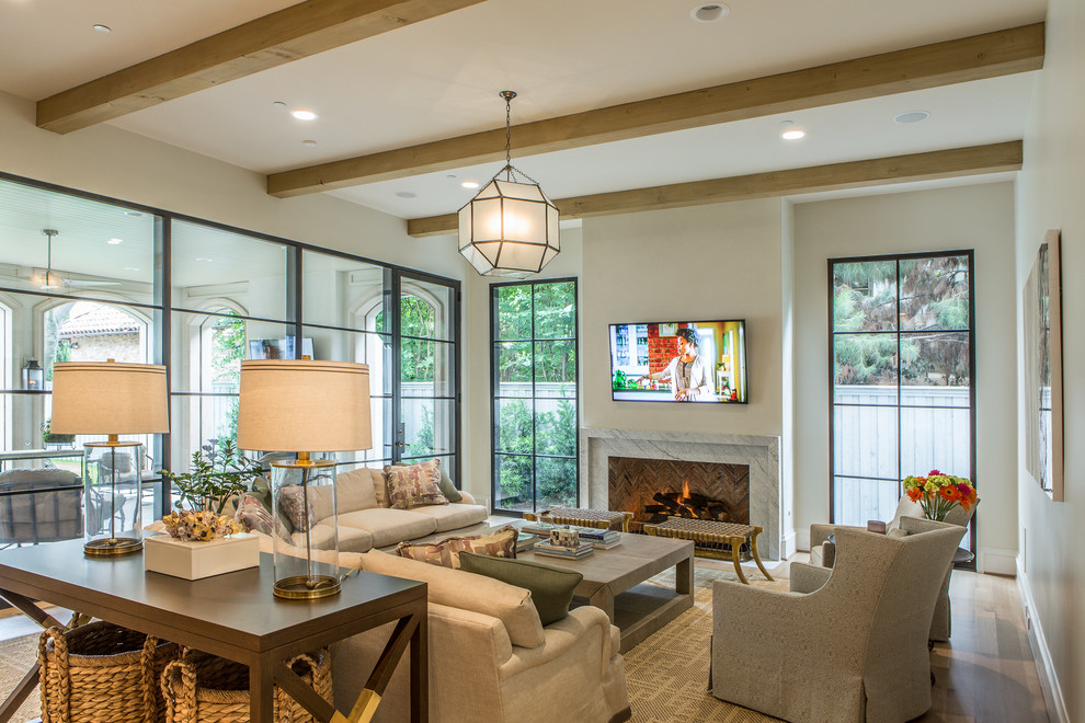 Transitional open concept living room in Dallas with white walls, light hardwood floors, a standard fireplace, a stone fireplace surround and a wall-mounted tv.