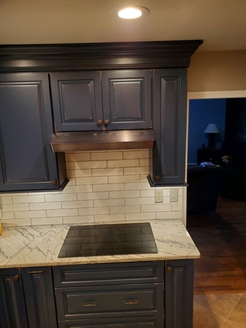 Dark Blue Cabinetry Makes for a Warm & Welcoming Kitchen