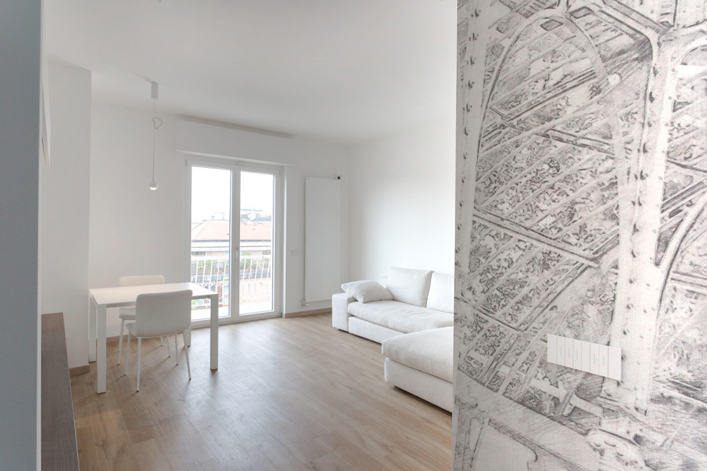 Ispirazione per un soggiorno minimal di medie dimensioni e aperto con pareti bianche, pavimento in vinile, parete attrezzata e pavimento beige