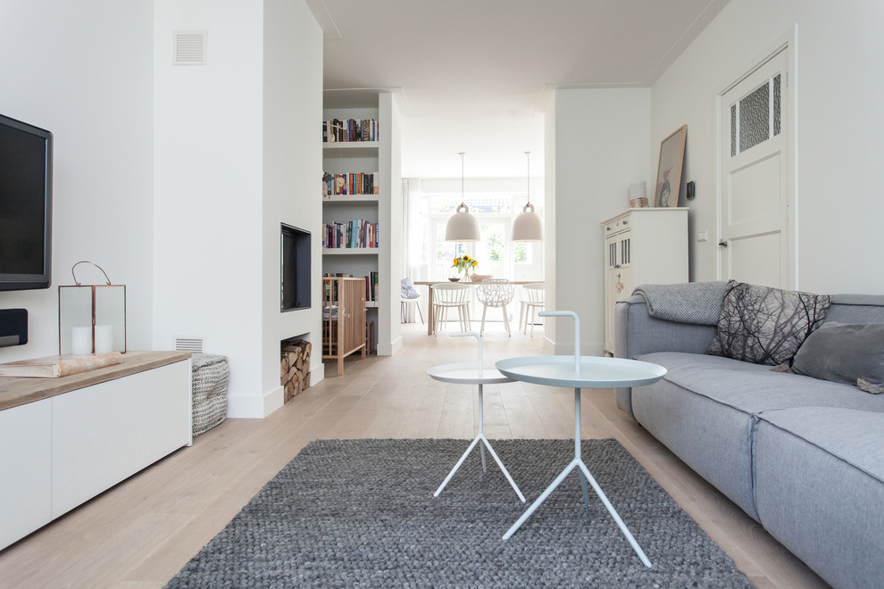Design ideas for a scandinavian living room in Amsterdam.