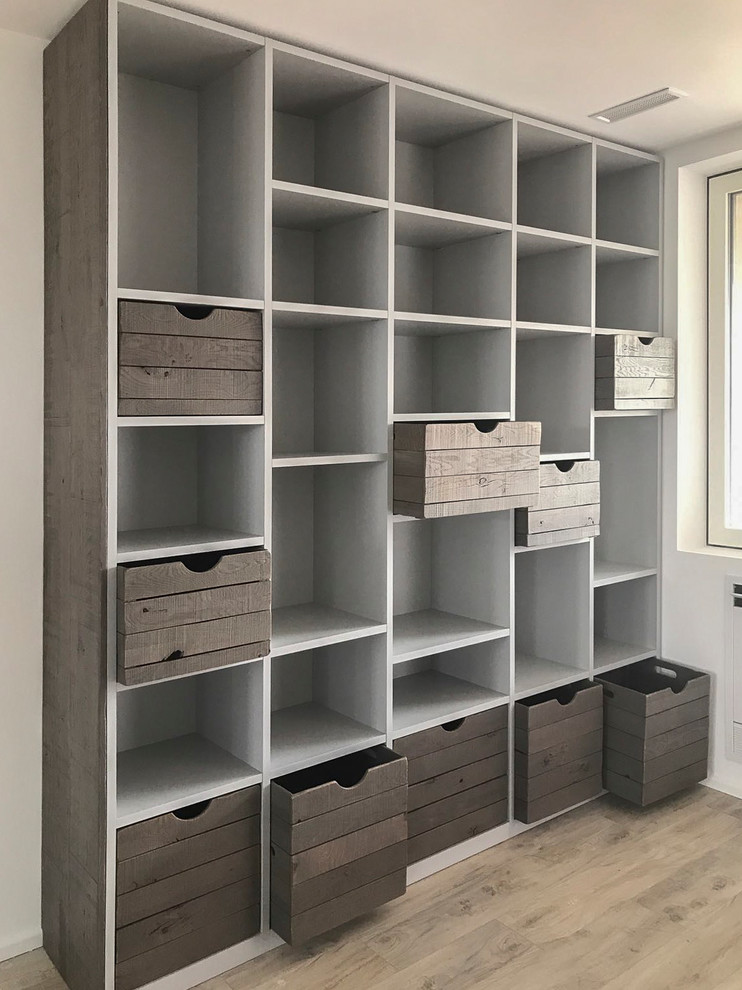 Design ideas for an industrial storage and wardrobe in Milan.