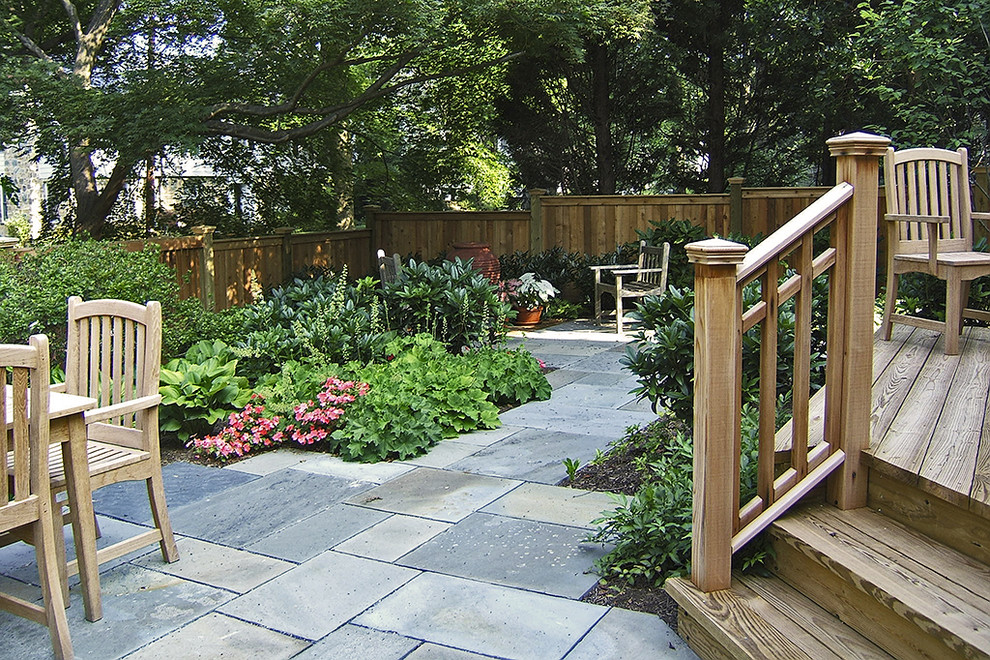 Mid-sized traditional backyard deck in DC Metro.