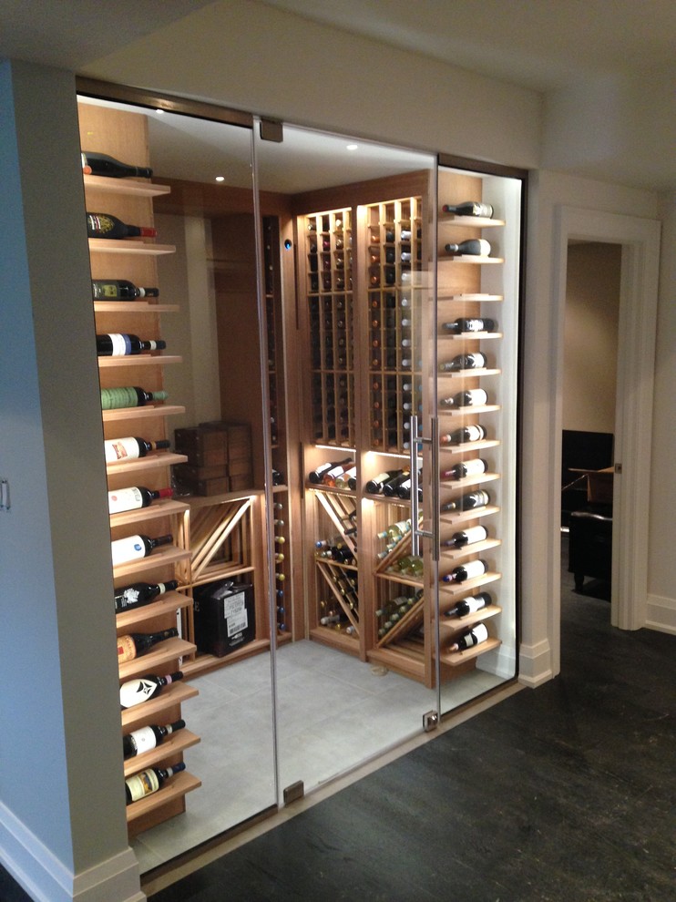 This is an example of a contemporary wine cellar in Toronto.