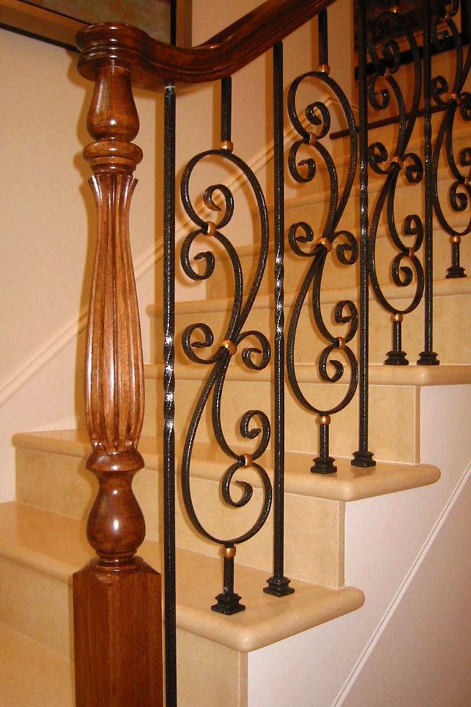 Staircase - large traditional marble u-shaped wood railing staircase idea in Boston with marble risers