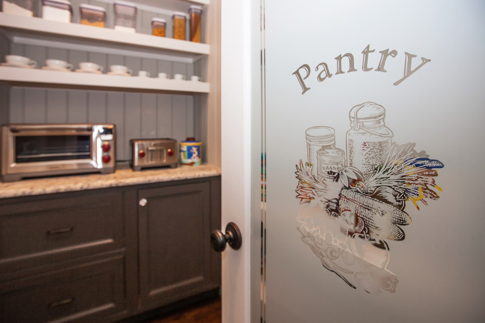 Mid-sized traditional u-shaped kitchen pantry in Boston with a farmhouse sink, beaded inset cabinets, white cabinets, wood benchtops, beige splashback, cement tile splashback, stainless steel appliances, dark hardwood floors and with island.