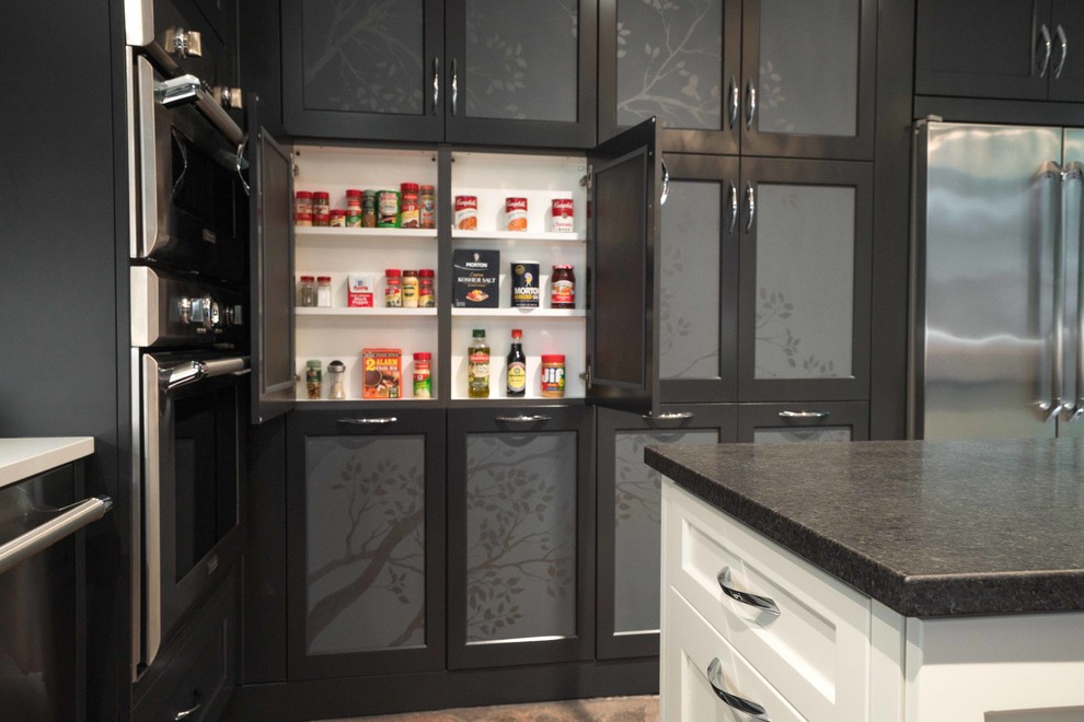 Kitchen - mid-sized transitional kitchen idea in Austin with flat-panel cabinets