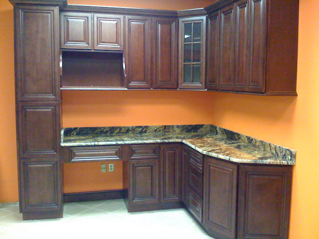 Transitional kitchen photo in DC Metro with beaded inset cabinets, dark wood cabinets, marble countertops and an island