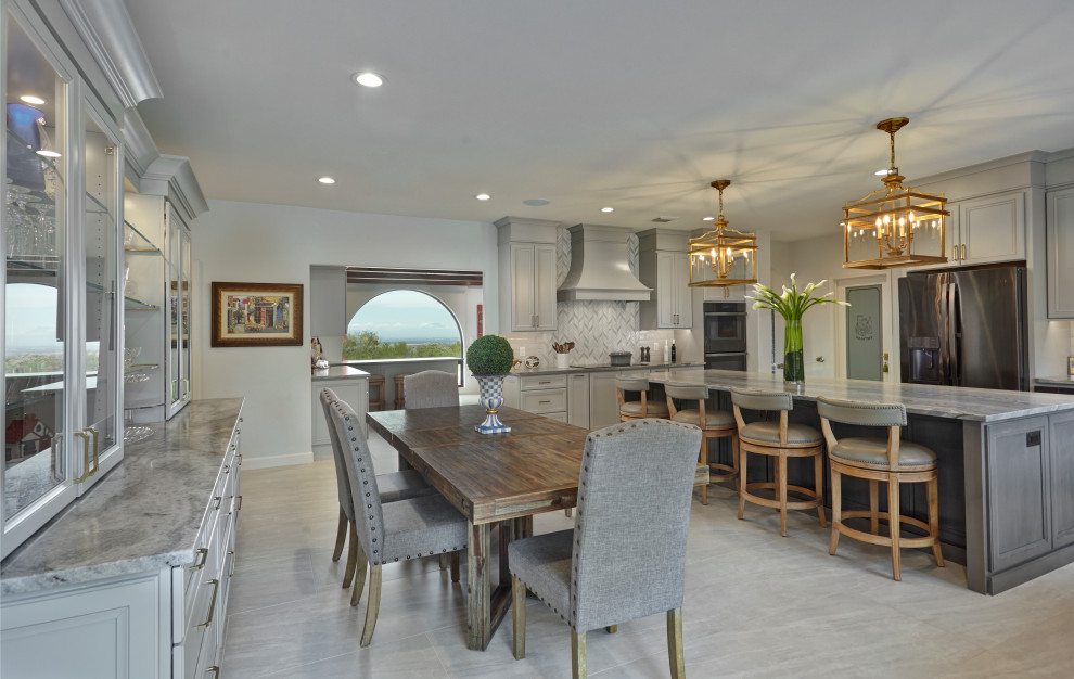 Inspiration for a transitional l-shaped kitchen remodel in Phoenix with an island