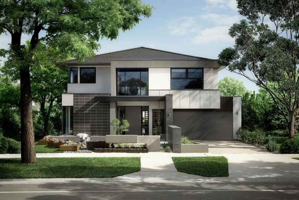 Mid-sized contemporary two-storey multi-coloured house exterior in Melbourne with mixed siding and a hip roof.