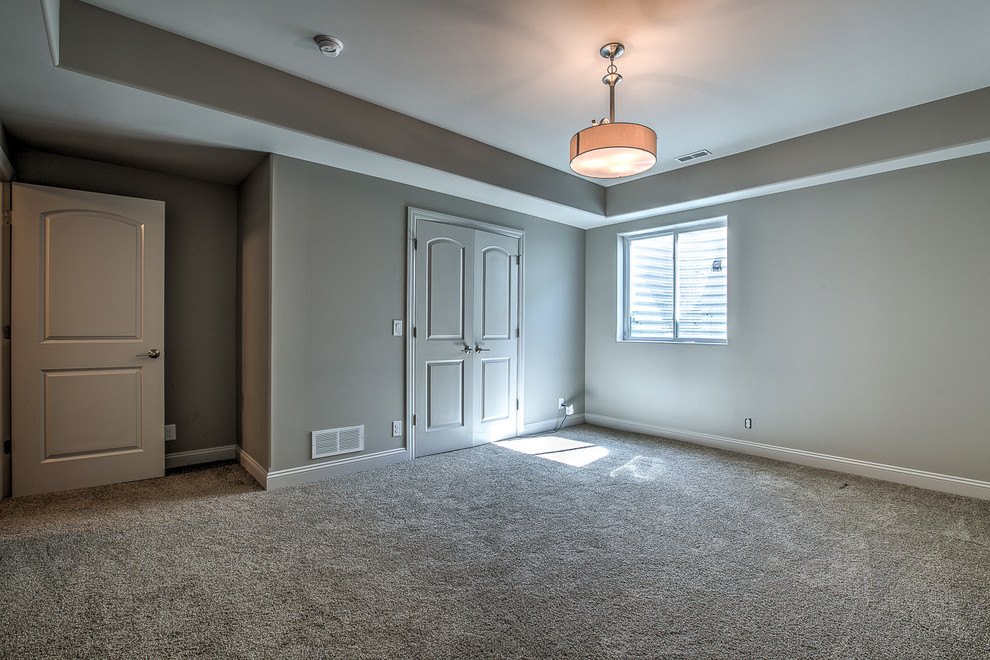 Example of a transitional home design design in Omaha