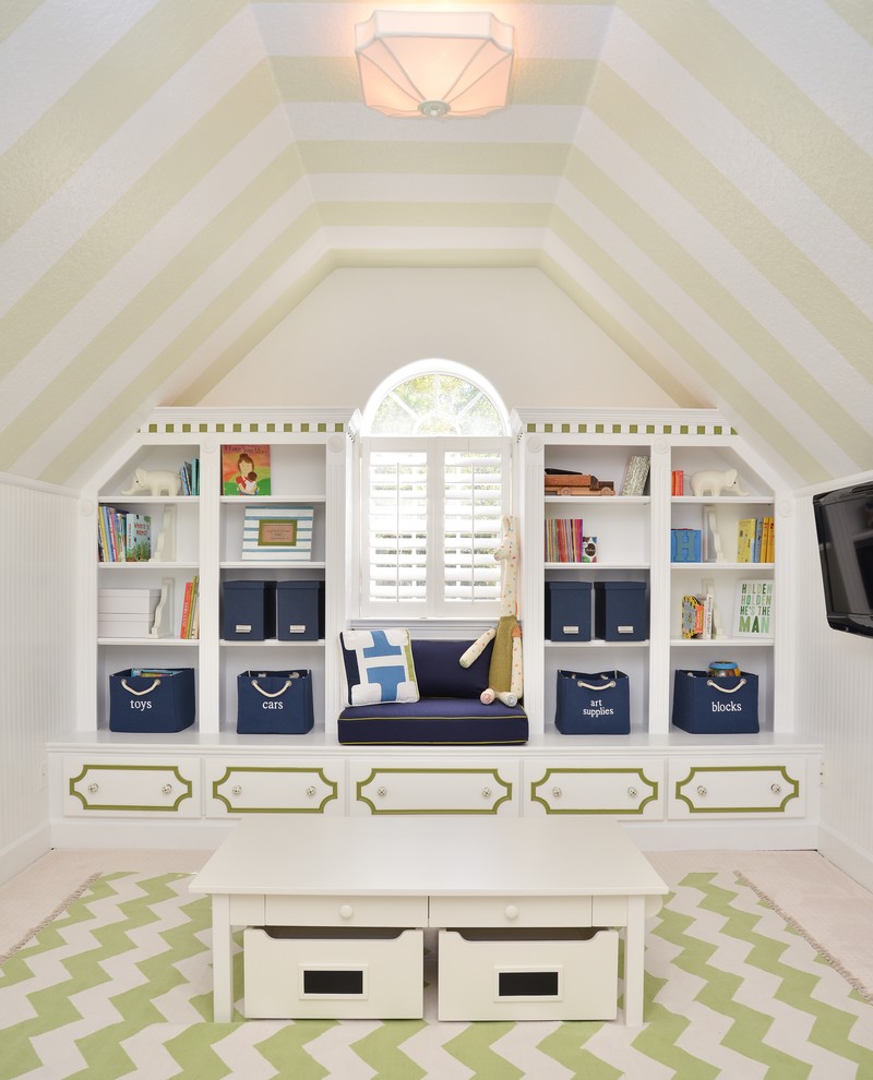 Photo of a transitional gender-neutral kids' playroom for kids 4-10 years old in Orlando with white walls and carpet.