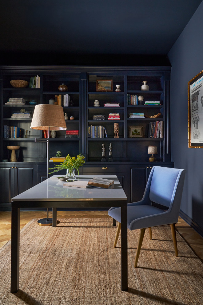 Example of a transitional home office design in Los Angeles
