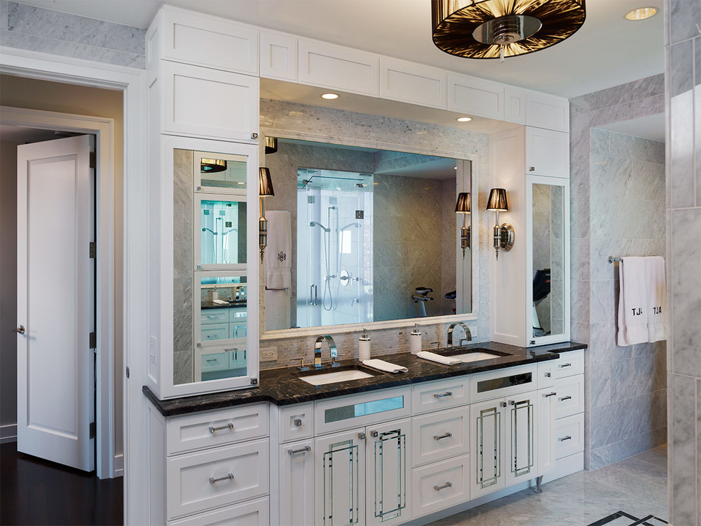 Inspiration for a mid-sized traditional master bathroom in Philadelphia with furniture-like cabinets, white cabinets, gray tile, porcelain tile, grey walls, porcelain floors, an undermount sink, granite benchtops and grey floor.