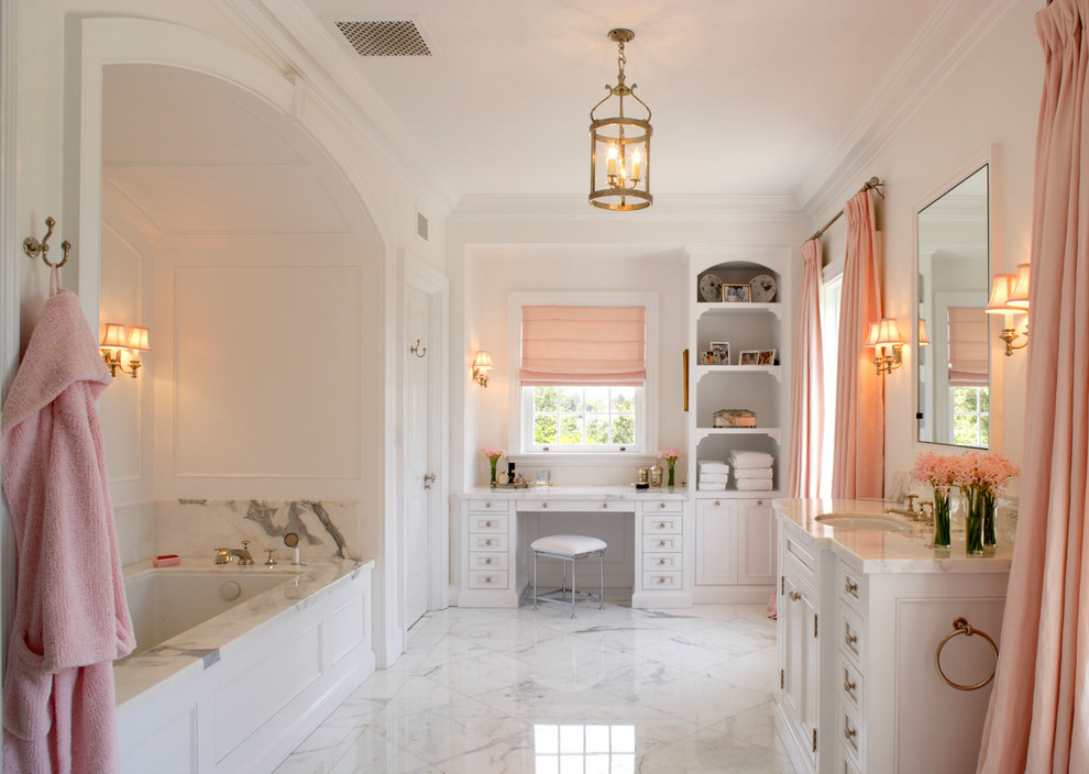 Design ideas for a large contemporary master bathroom in Los Angeles with white cabinets, an undermount tub, white walls, marble floors, an undermount sink, marble benchtops, white floor and shaker cabinets.