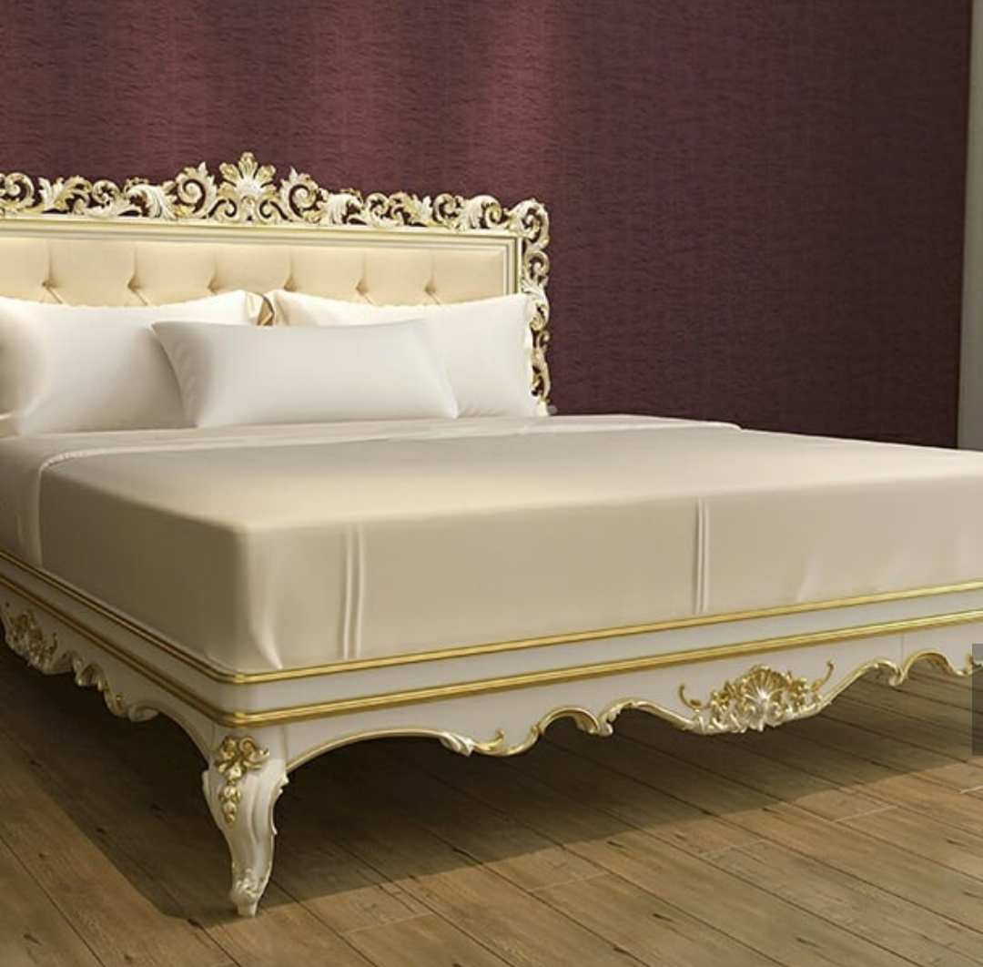 Оформление кровати в спальне.