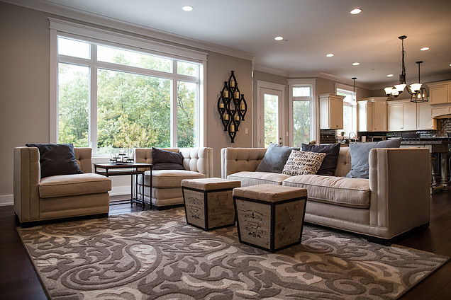 Inspiration for a large transitional open concept family room in Chicago with grey walls and bamboo floors.