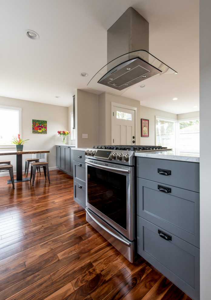 Example of a transitional kitchen design in Seattle