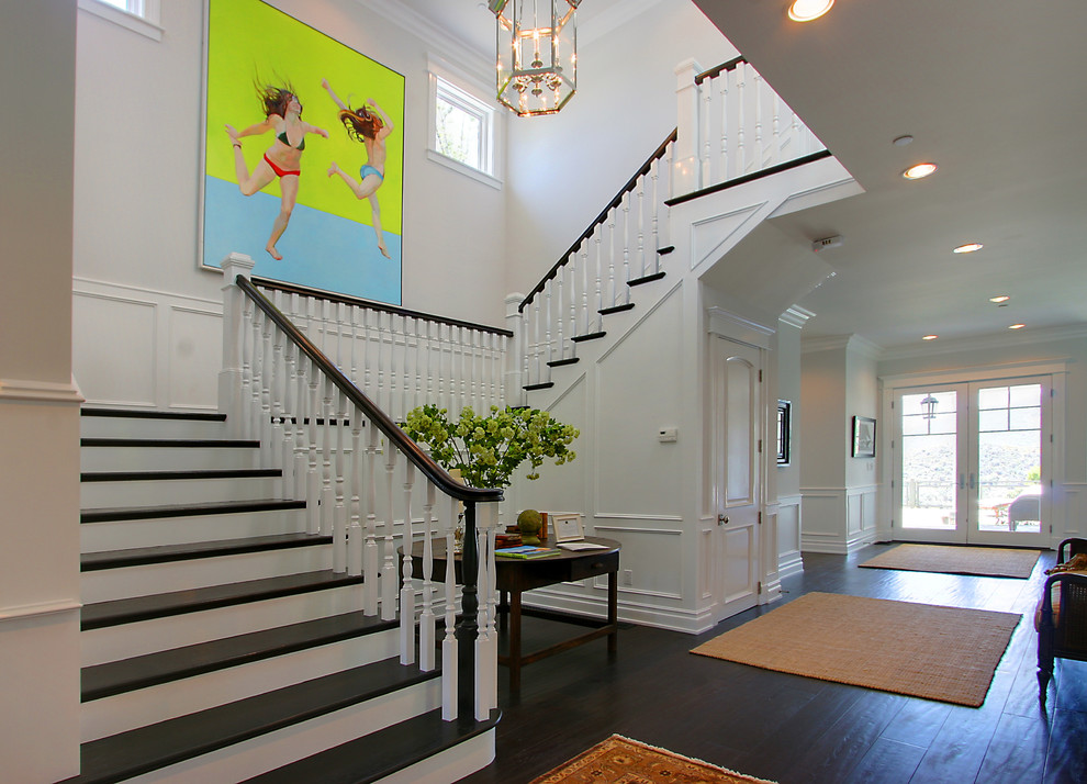 This is an example of a traditional wood u-shaped staircase in Los Angeles.