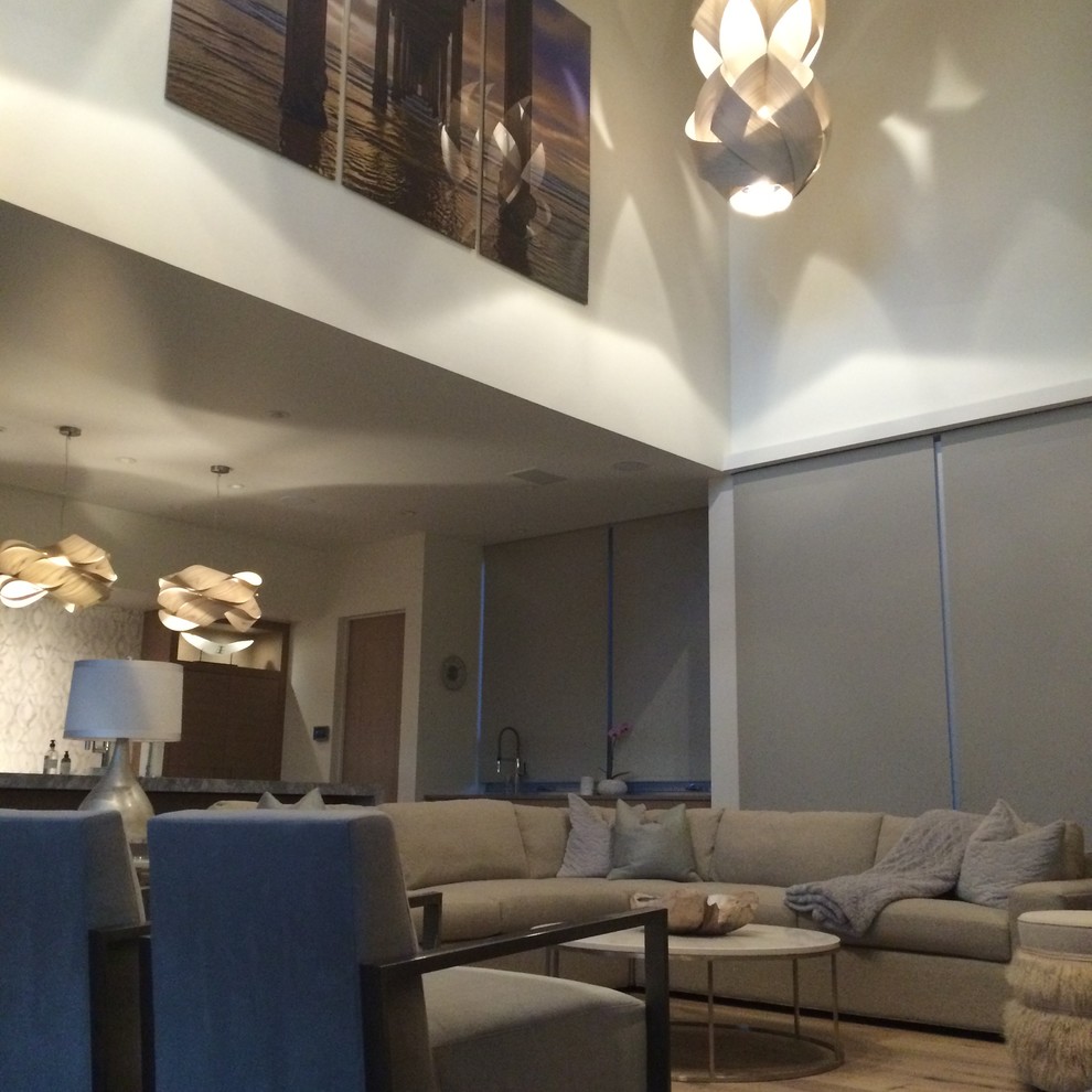 This is an example of a contemporary family room in Denver.