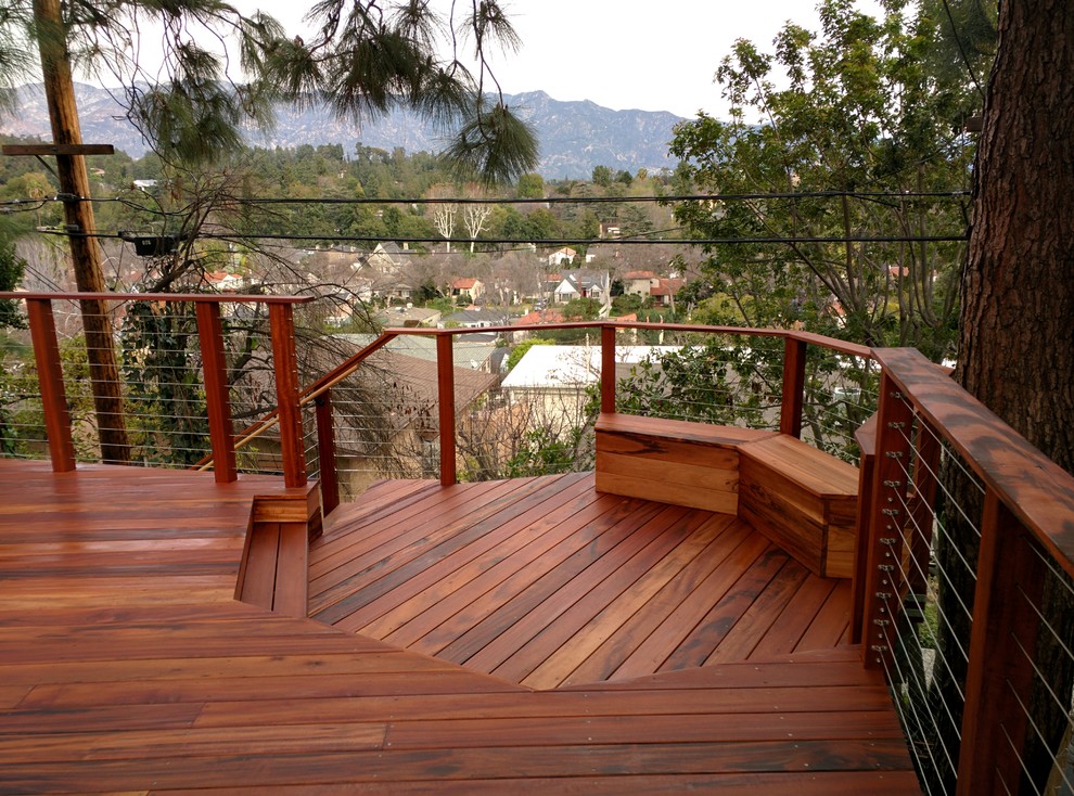Mid-sized country backyard deck in Los Angeles with no cover.