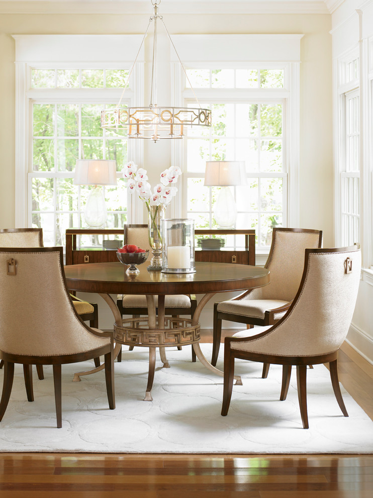 This is an example of a mid-sized contemporary separate dining room in Charleston with beige walls, no fireplace and dark hardwood floors.