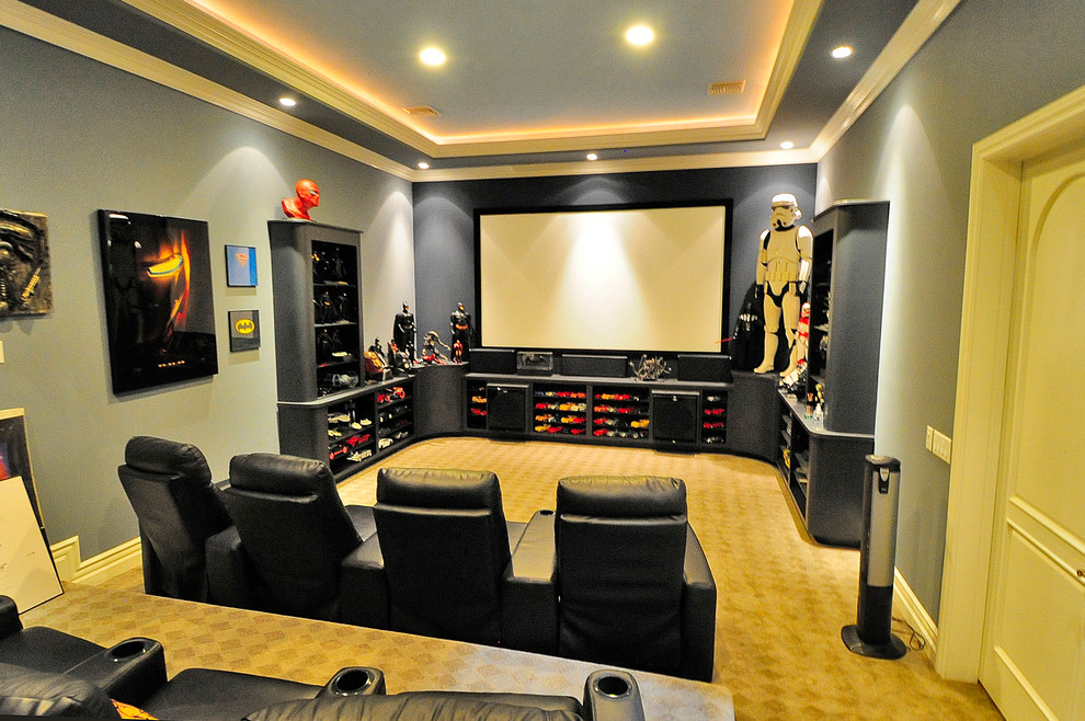 Photo of a large contemporary enclosed home theatre in Los Angeles with carpet, blue walls and beige floor.