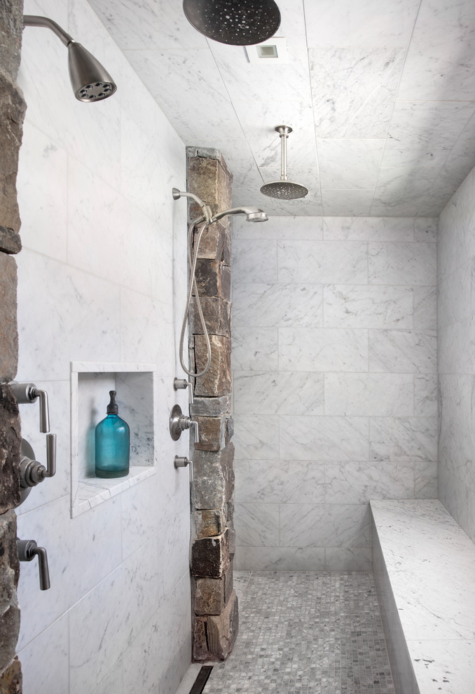 This is an example of a country master bathroom in Other with a double shower and white tile.