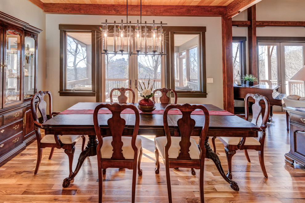 Inspiration for a rustic light wood floor great room remodel
