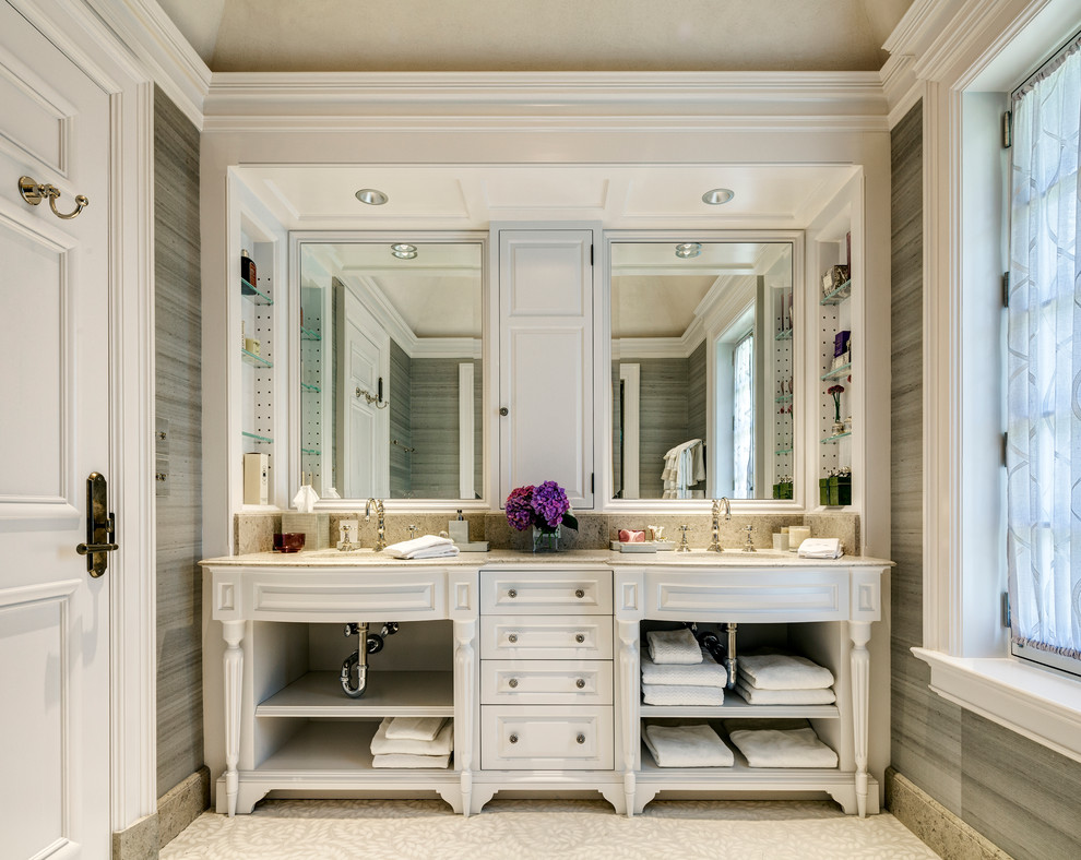 Photo of a traditional master bathroom in New York with open cabinets, beige tile, ceramic tile, grey walls, mosaic tile floors, an undermount sink, granite benchtops and white cabinets.