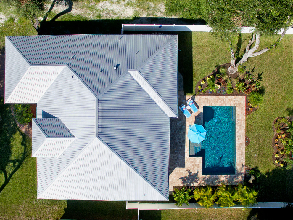 Design ideas for a tropical rectangular pool in Orlando.