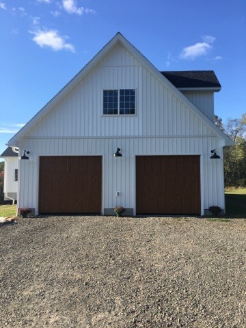 This is an example of a country attached garage in Other.
