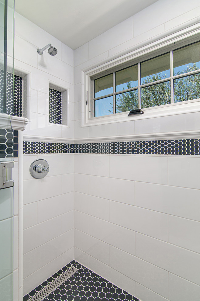 Inspiration for a mid-sized traditional kids bathroom in San Diego with white cabinets, a corner shower, white tile, ceramic tile, blue walls, porcelain floors, a drop-in sink and marble benchtops.