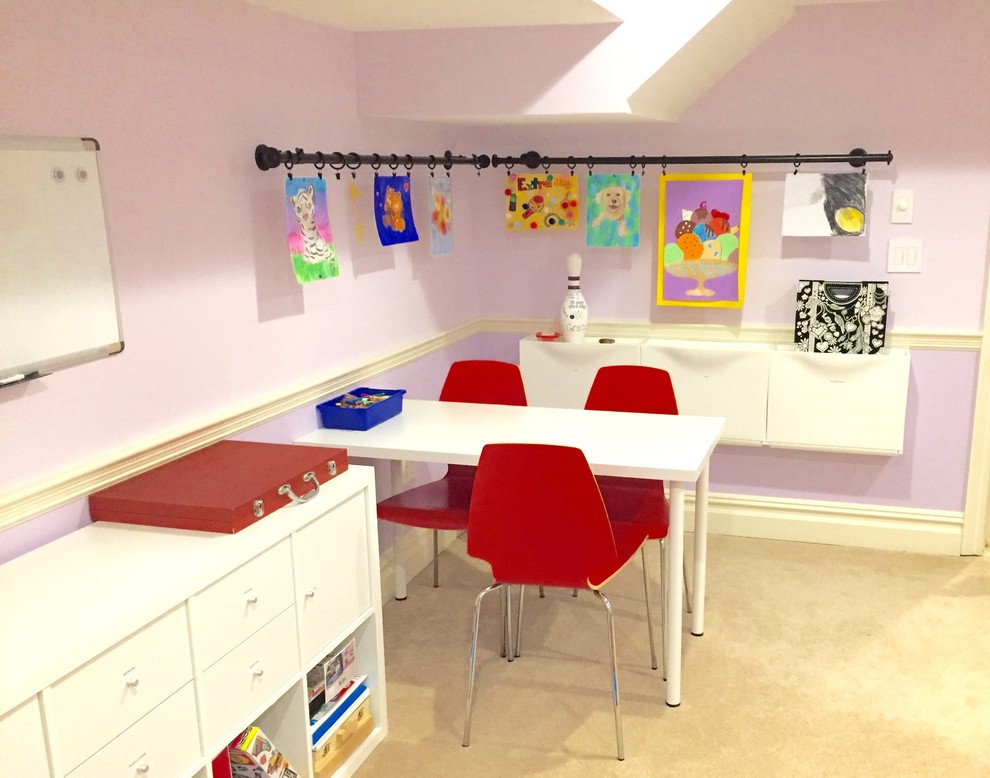 Mid-sized transitional gender-neutral kids' playroom in New York with purple walls, carpet and beige floor for kids 4-10 years old.