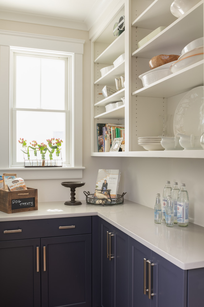 Transitional kitchen photo in Providence with an undermount sink, shaker cabinets, quartzite countertops, subway tile backsplash and an island