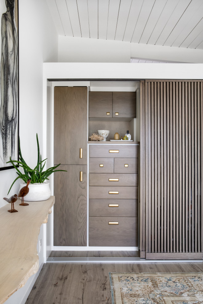 This is an example of a beach style storage and wardrobe in Orange County.