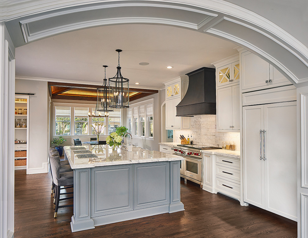 Inspiration for an expansive traditional kitchen in Dallas with recessed-panel cabinets, white cabinets and with island.