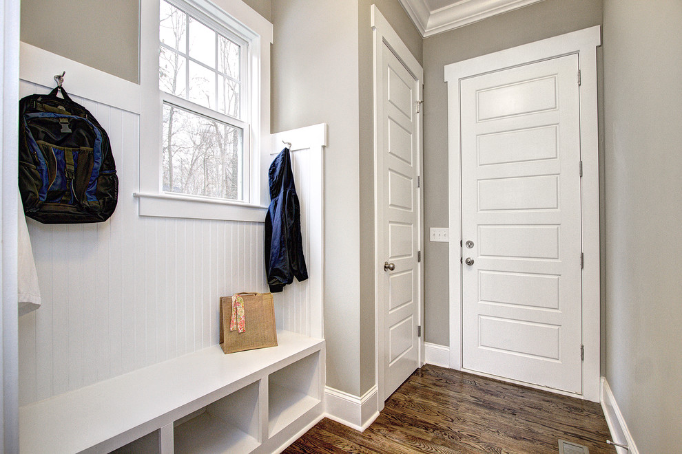 Design ideas for a mid-sized transitional mudroom in Charlotte.