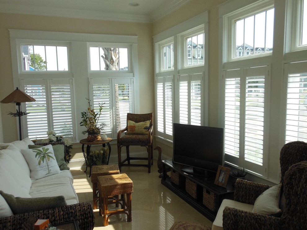 Design ideas for a transitional sunroom in Charleston.