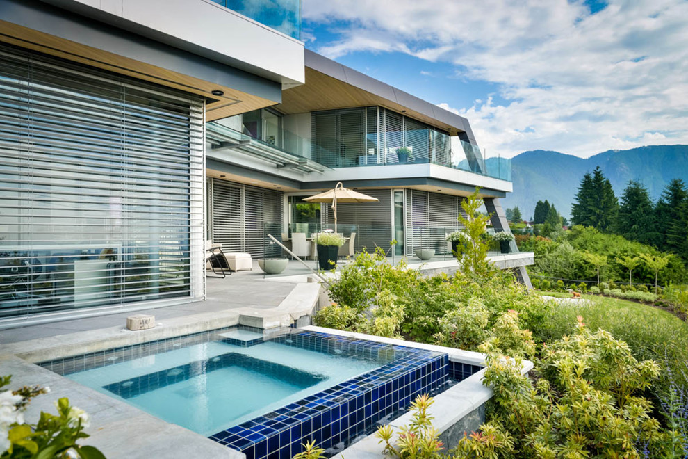 Design ideas for a contemporary two-storey exterior in Vancouver.