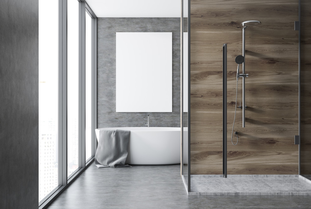 This is an example of a small modern master bathroom in Denver with a freestanding tub, a corner shower, grey walls, concrete floors, grey floor, a hinged shower door and wood walls.