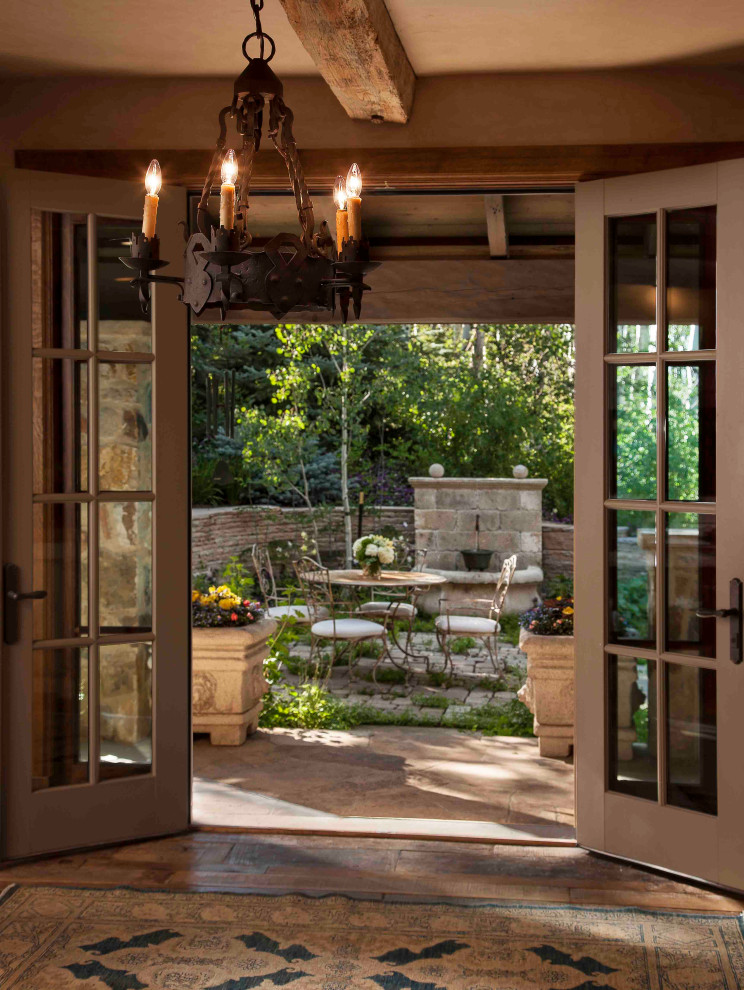 Mountain style home design photo in Denver