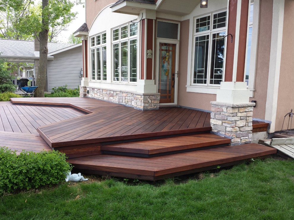 Inspiration for a large transitional backyard deck remodel in Minneapolis with no cover