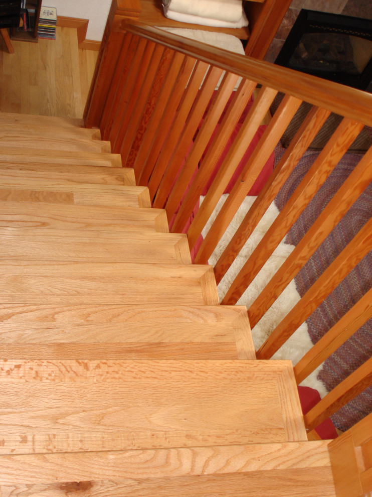 Custom Wood Stair Railing and Wood Flooring on Stairway and Hall