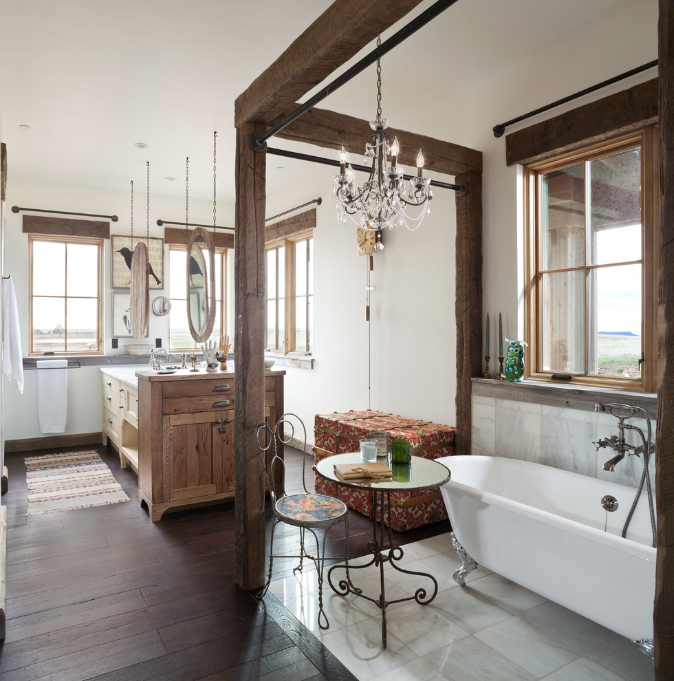 Inspiration for a mid-sized country bathroom in Denver with an open shower, gray tile, metal tile, white walls and dark hardwood floors.
