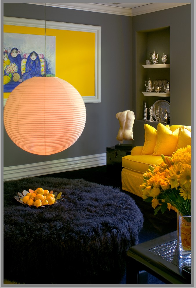 Inspiration for an eclectic family room in Los Angeles with grey walls.