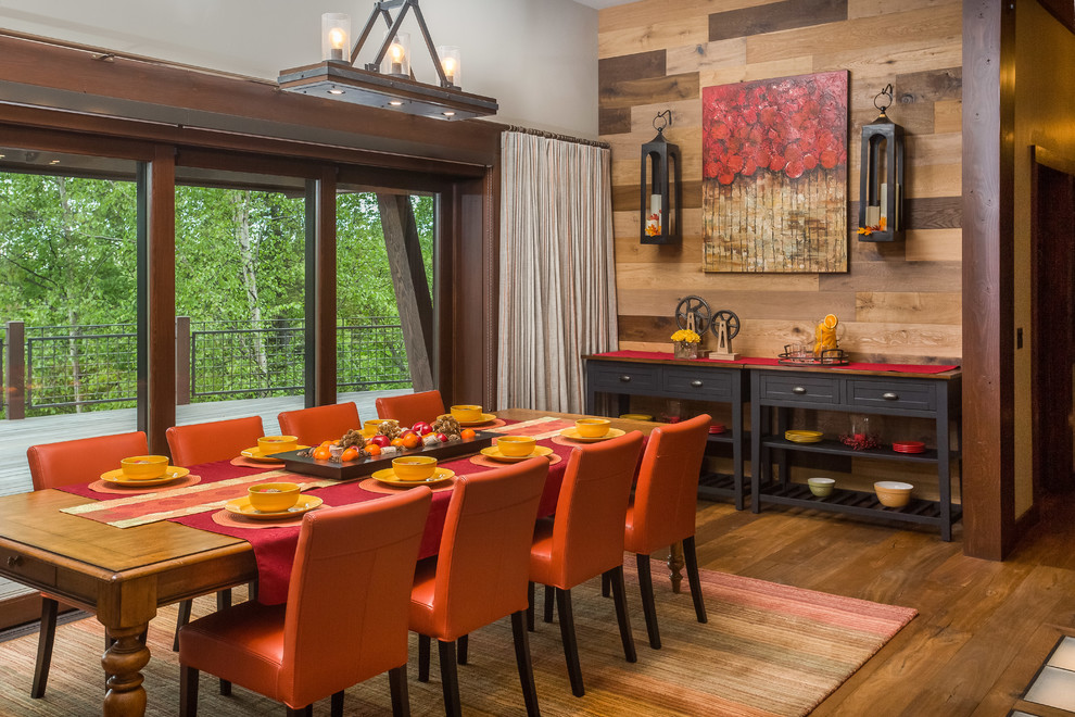 Design ideas for a large country dining room in Other with medium hardwood floors and brown floor.