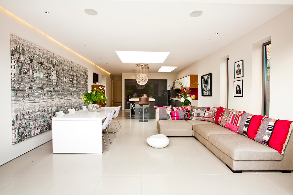 Photo of a large contemporary open concept living room in London.